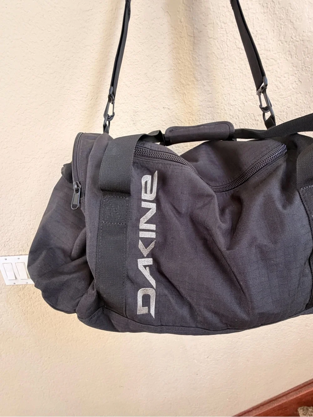 DAKINE Black Men’s Duffel with White Logo